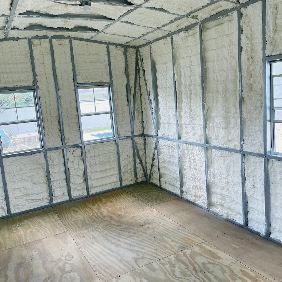 Closed-cell spray foam insulation applied to wall cavities in a residential project in Maplewood